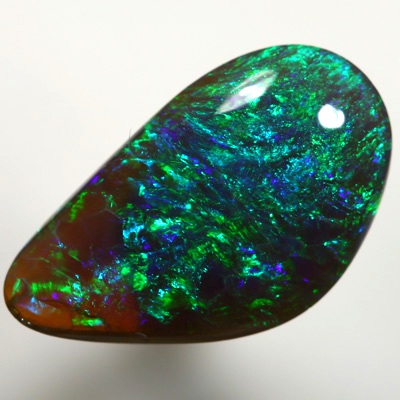 SOLID BLACK CRYSTAL OPAL Sparkling greens and blues, 3 dimensional pattern. SEE VIDEO